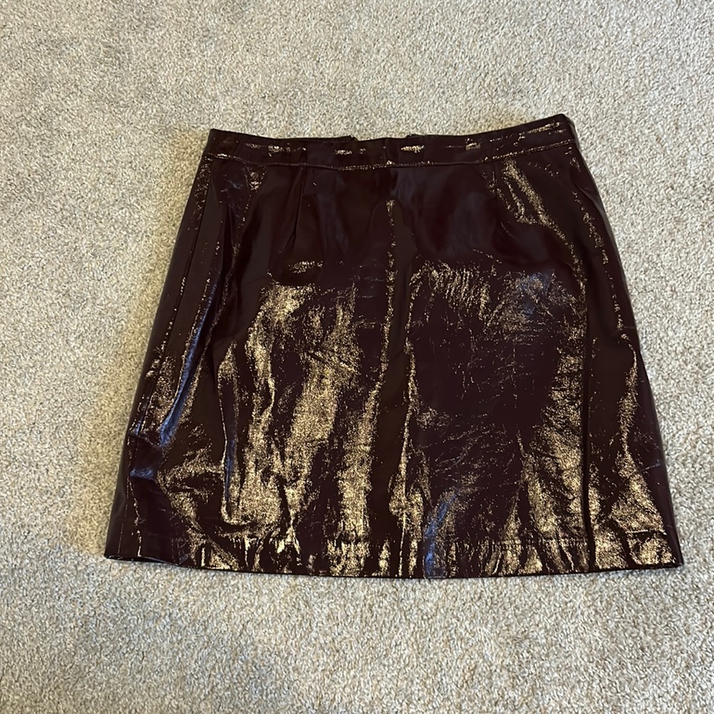 Never worn new maroon perfect M fit skirt with zipper on back